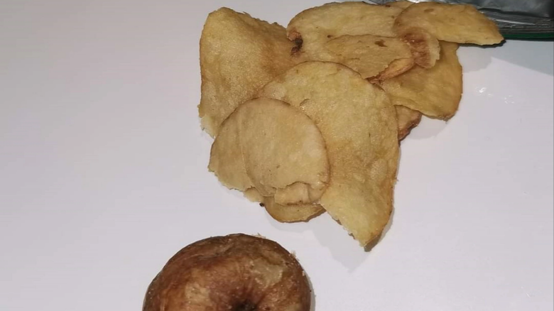 I opened a bag of cheese and onion crisps and found a huge soggy potato inside